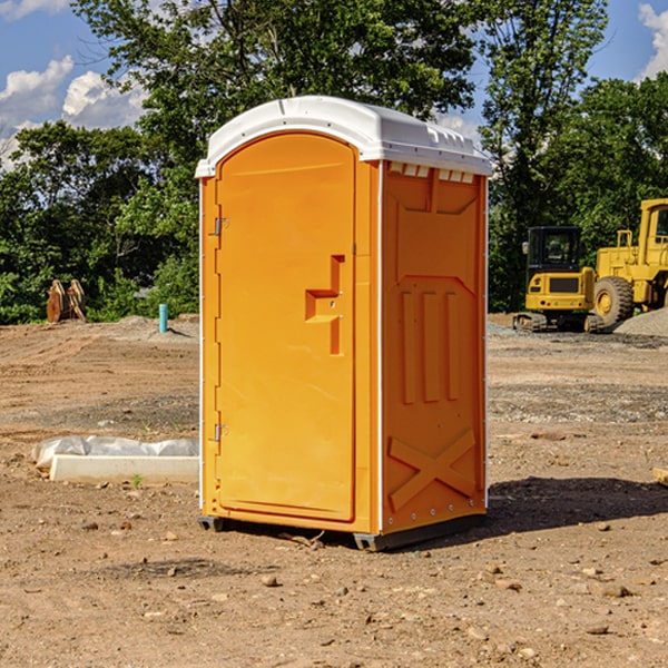 how often are the porta potties cleaned and serviced during a rental period in Rockingham